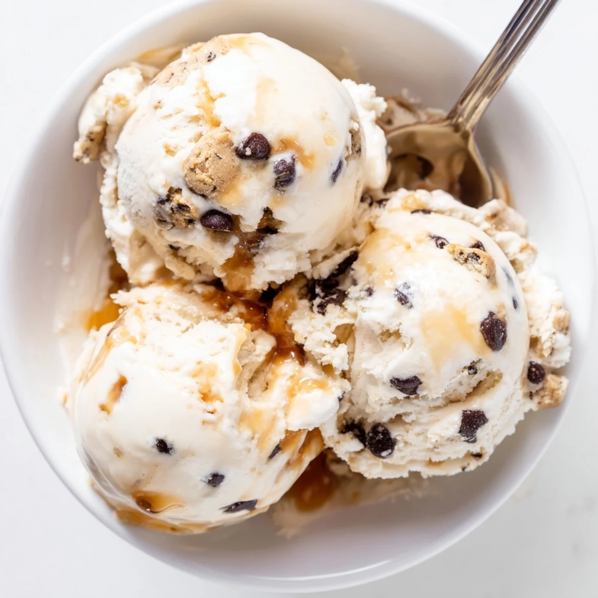 Creamy cottage cheese ice cream with cookie dough bites, perfect for summer treats.  