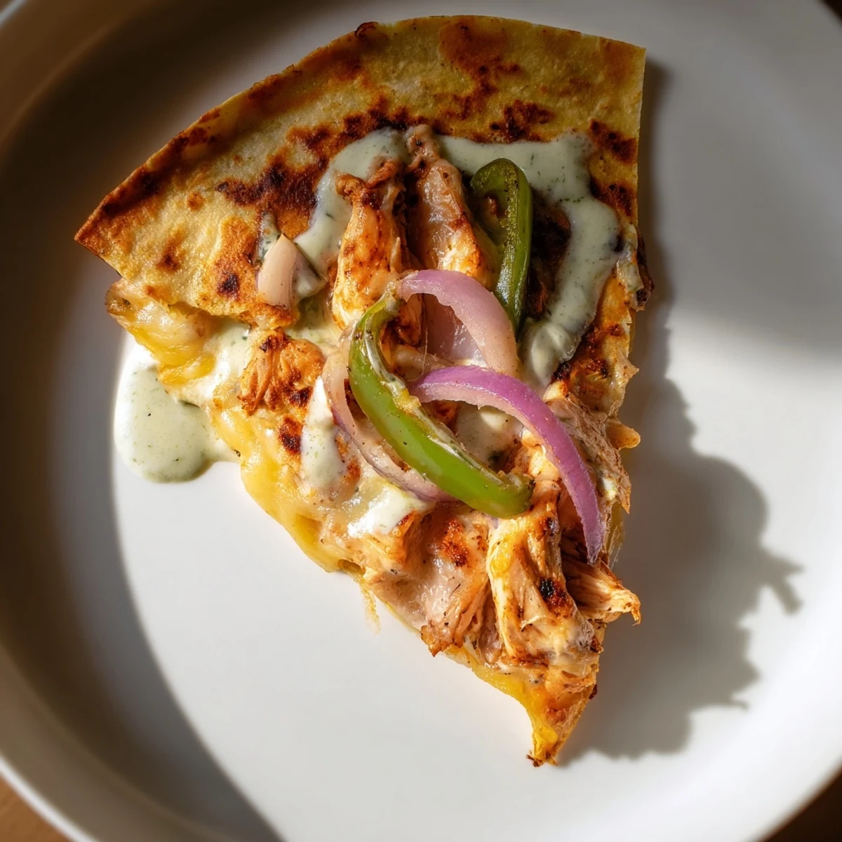 Crispy golden-brown Tandoori Chicken Quesadilla, oozing melted cheese and filled with flavorful chicken.