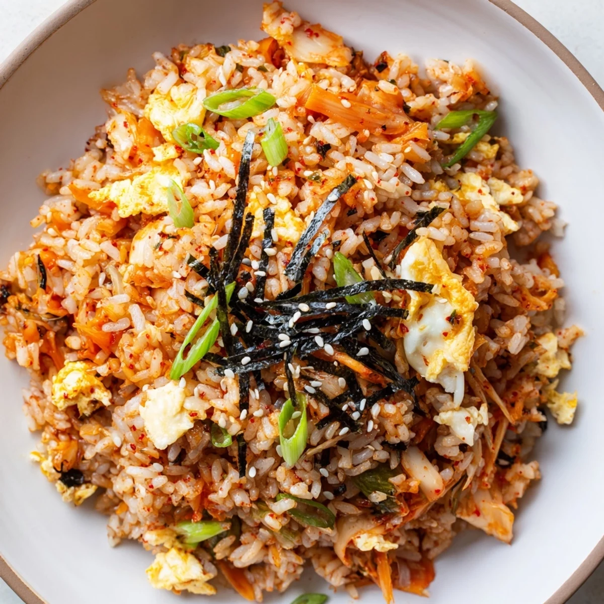 Savory Spicy Kimchi Fried Rice with fluffy rice and vibrant kimchi, perfect for a quick and flavorful meal.