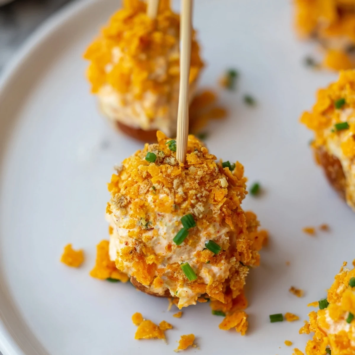 Cream Cheese Flamin Hot Pretzel Biscuit Skewers with a spicy, crunchy coating and creamy filling.  