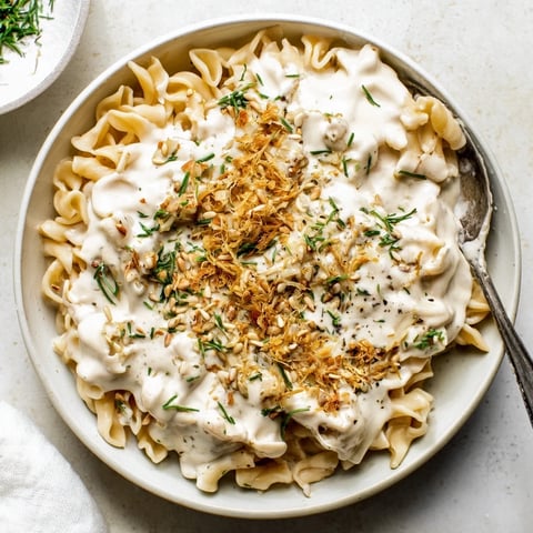 Creamy miso ditalini, a bowl of rich pasta coated in velvety sauce, ready to serve with scallions.