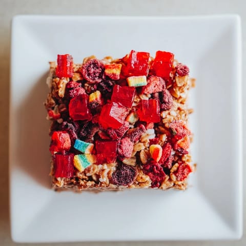 Chewy homemade gummies and colorful freeze-dried toppings make these delightful snack bars.  
