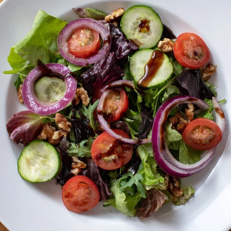 This Quick Balsamic Vinegar Salad features a bright, flavorful dressing coating fresh mixed ingredients.